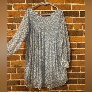 Free People blue dress. Lightweight and wearable for all occasions. Deep V back
